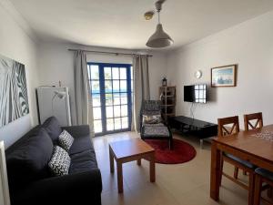 Posedenie v ubytovaní Casa Iris - central apartment with panoramic views