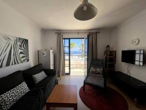 Posedenie v ubytovaní Casa Iris - central apartment with panoramic views