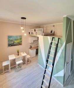 a room with a loft bed and a dining room at Heart of Natural Park, Sea and River in Rīga