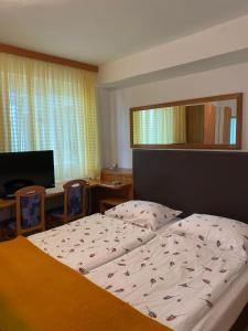 Postel nebo postele na pokoji v ubytování Pension Carinthia