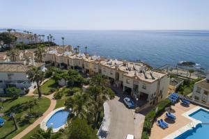 an aerial view of the resort and the ocean at Pueblo Marina Seaside Apartaments by Alfresco Stays in Mijas Costa