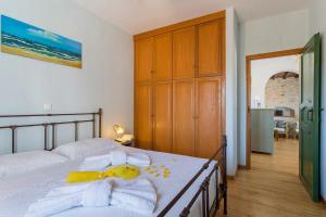 A bed or beds in a room at SAIL VILLA
