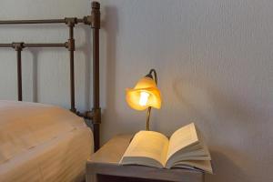 A bed or beds in a room at SAIL VILLA