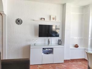 TV a/nebo společenská místnost v ubytování INMOGEST - Verdiales Apartamento Eleven-28