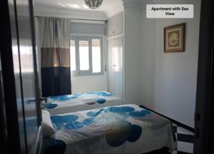 Voodi või voodid majutusasutuse Martil Center Apartments toas