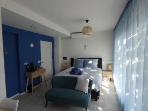 Un ou plusieurs lits dans un hébergement de l'établissement B&B Badhuis