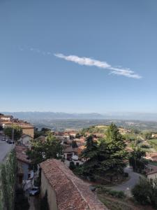 a view of a city from the top of a building at La magia delle Langhe appartamenti con vista in Novello