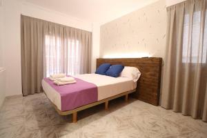 Zdjęcie z galerii obiektu HOTEL H104 I Posada del Mar I Encantador hostel en la playa de Gandia w mieście Los Mártires