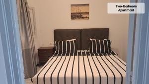 Voodi või voodid majutusasutuse Martil Center Apartments toas