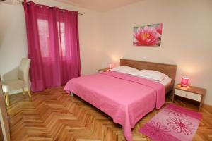 Llit o llits en una habitació de Apartment Biočić
