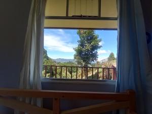 a window with a view of a mountain view at Finca el Calar El mejor lugar para buscar la paz in Empalme