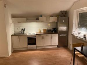 Ett kök eller pentry på Great Apartment in central Härnösand