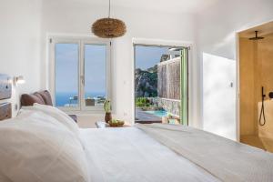 Posteľ alebo postele v izbe v ubytovaní KLIDON Dreamy Living Suites + 37 fotografií