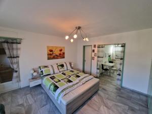 Postel nebo postele na pokoji v ubytování Apartment Ferreira