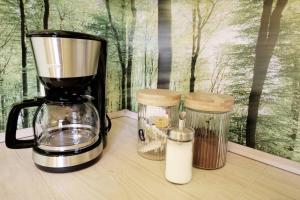Παροχές για τσάι/καφέ στο SECRET HIDEAWAYS Wood Lodge mit Kinderzimmer Messe l City l Flughafen l Hbf