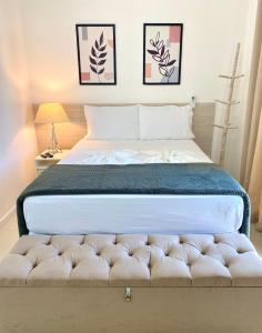 Säng eller sängar i ett rum på Apto Bella Citta em Cabo Frio
