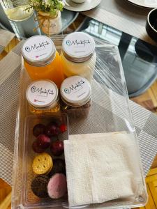 a plastic container filled with different types of food at Maktub Brasil - Hostal Boutique in Santiago
