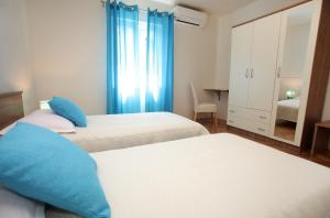 Posteľ alebo postele v izbe v ubytovaní Apartment Biočić
