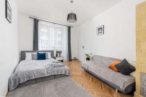 Voodi või voodid majutusasutuse Corner Apartments near Vistula River toas