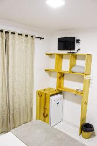 TV a/nebo společenská místnost v ubytování Pousada Paradise Flecheiras