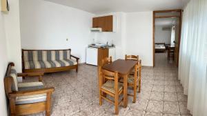 A kitchen or kitchenette at Sfinias Apartments