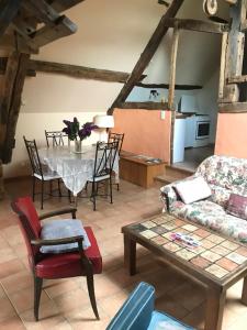 Posezení v ubytování Ancien moulin du 18 ieme