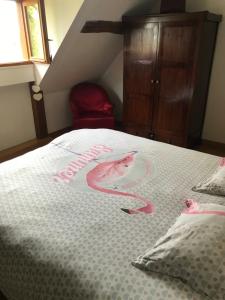Postel nebo postele na pokoji v ubytování Ancien moulin du 18 ieme