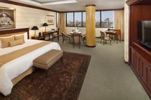 Rúm í herbergi á Hotel Melia Lima