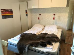 Säng eller sängar i ett rum på Blåbärsvägen 2a