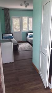 Postel nebo postele na pokoji v ubytování Эдем ИссыкКуль