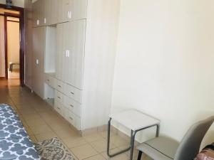 Postel nebo postele na pokoji v ubytování Maliaways Comfy Airbnb-Jkia