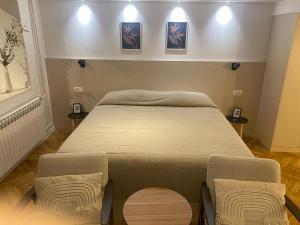Posteľ alebo postele v izbe v ubytovaní Apartments Nikval