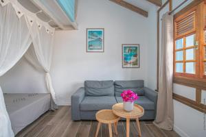 Posezení v ubytování Bungalow Ti Banane + 7 fotografií