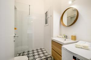 A bathroom at Stylish yellow suite in the heart of Budapest