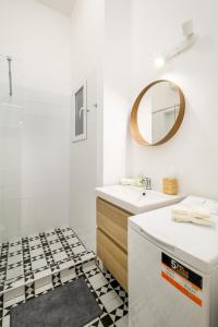 A bathroom at Stylish yellow suite in the heart of Budapest