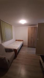 Postel nebo postele na pokoji v ubytování Apartman TATTOO R LUX