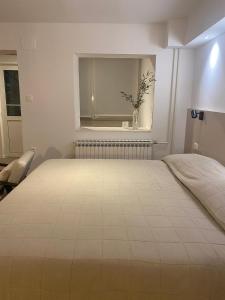 Posteľ alebo postele v izbe v ubytovaní Apartments Nikval