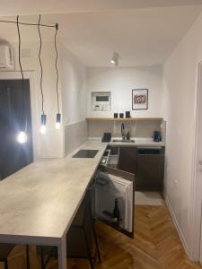 Kuchyňa alebo kuchynka v ubytovaní Apartments Nikval