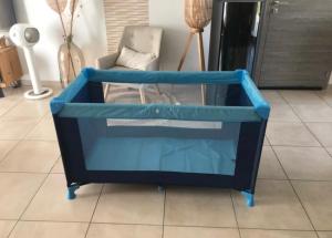 a blue container with a chair in a room at Maison Individuelle Tout Confort Terrasse Extérieur Proche Parc Asterix, Aéroport Roissy CDG, Paris, Disney, Château de Chantilly in La Chapelle-en-Serval +47 photos