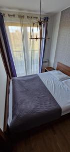 Postel nebo postele na pokoji v ubytování Apartament Lazurowe Wybrzeże Jastrzębia Góra