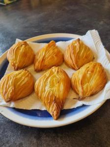 a plate of croissants sitting on a table at Spinola Bay Apt - Beatiful 3-Double Bed apt near beach in Prime Location in St Julian's +27 photos