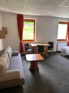 A seating area at Penzión Michaela Vyhne
