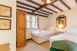 En eller flere senge i et værelse på Easy Access to Cromer, Sheringham, The Norfolk Broads and the Seaside - Woodfalls Barn
