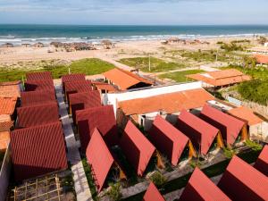 an aerial view of a beach with red roofs at Pousada Villa Al Mare in Luis Correia