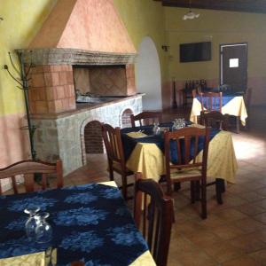 Um restaurante ou outro lugar para comer em Agriturismo Masseria Castiglione