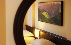 Cama ou camas em um quarto em Bogari Hotel