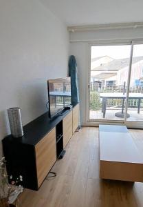 Kuchyňa alebo kuchynka v ubytovaní Appartement 6 personnes les Sables d'Olonne