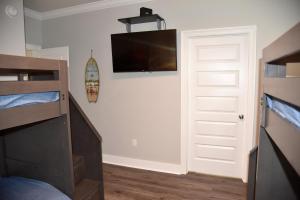 A bed or beds in a room at Lighthouse View