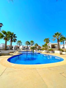 Bazén v ubytování Excelente Casa en Zona de Cerritos en Frente a Alberca - Azul Pacífico I nebo v jeho okolí