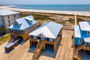 an aerial view of a house on the beach at Sunny & 75 in Dauphin Island